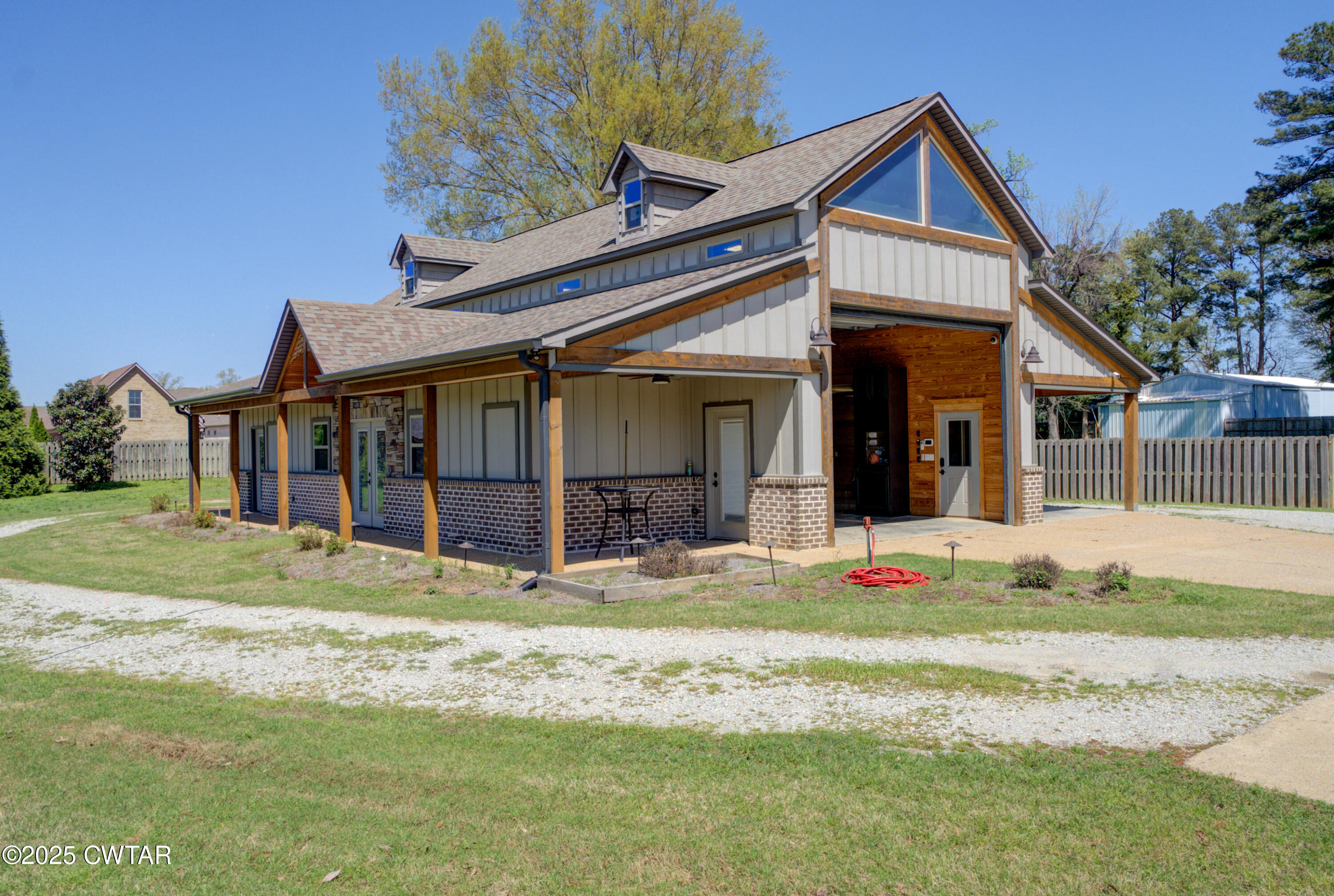 963 Ashport Road Jackson, TN 38305 - Photo 43 of 51 a front view of a house with a yard