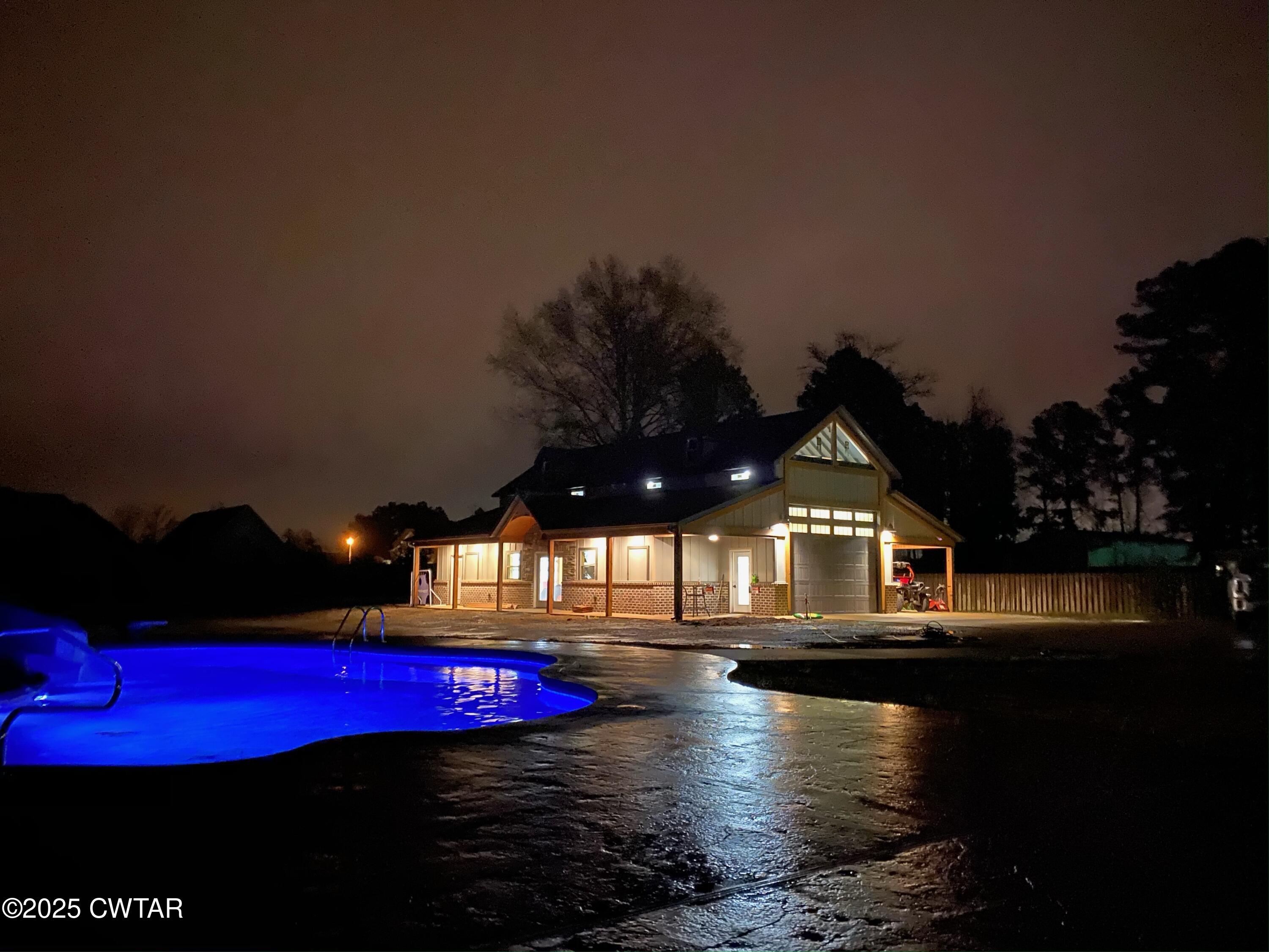 963 Ashport Road Jackson, TN 38305 - Photo 5 of 51 a view of swimming pool with outdoor seating