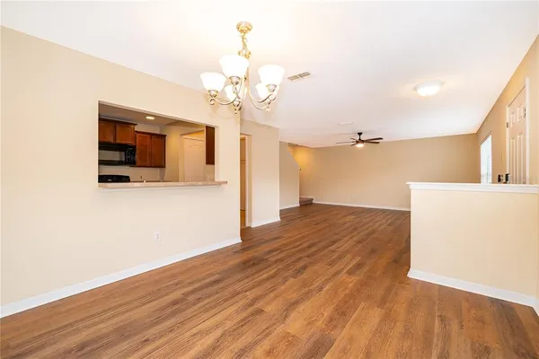 a view of a livingroom with wooden floor