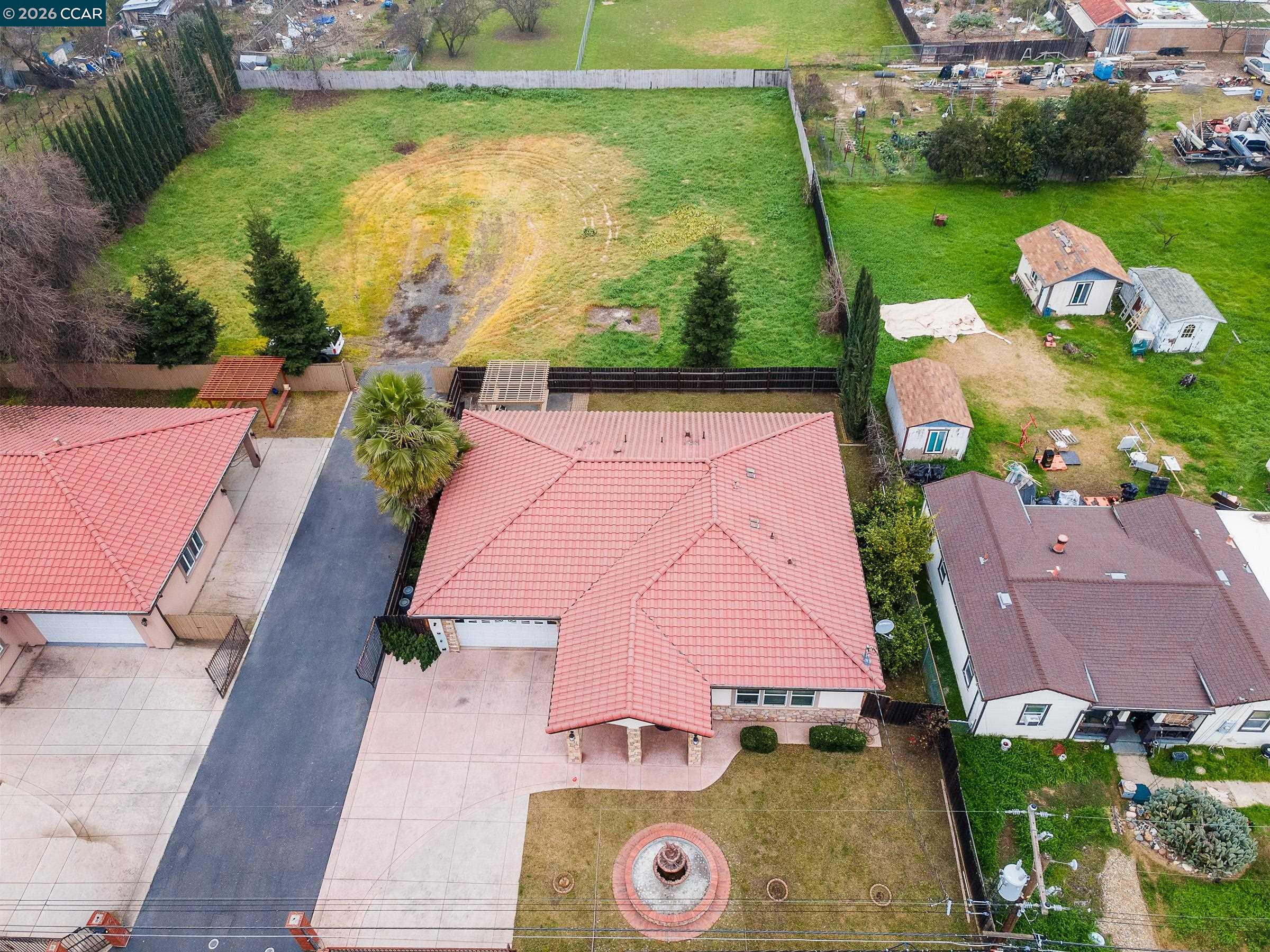 1021 Azusa Street Sacramento, CA 95833 - Photo 2 of 26 an aerial view of house with yard swimming pool and outdoor seating