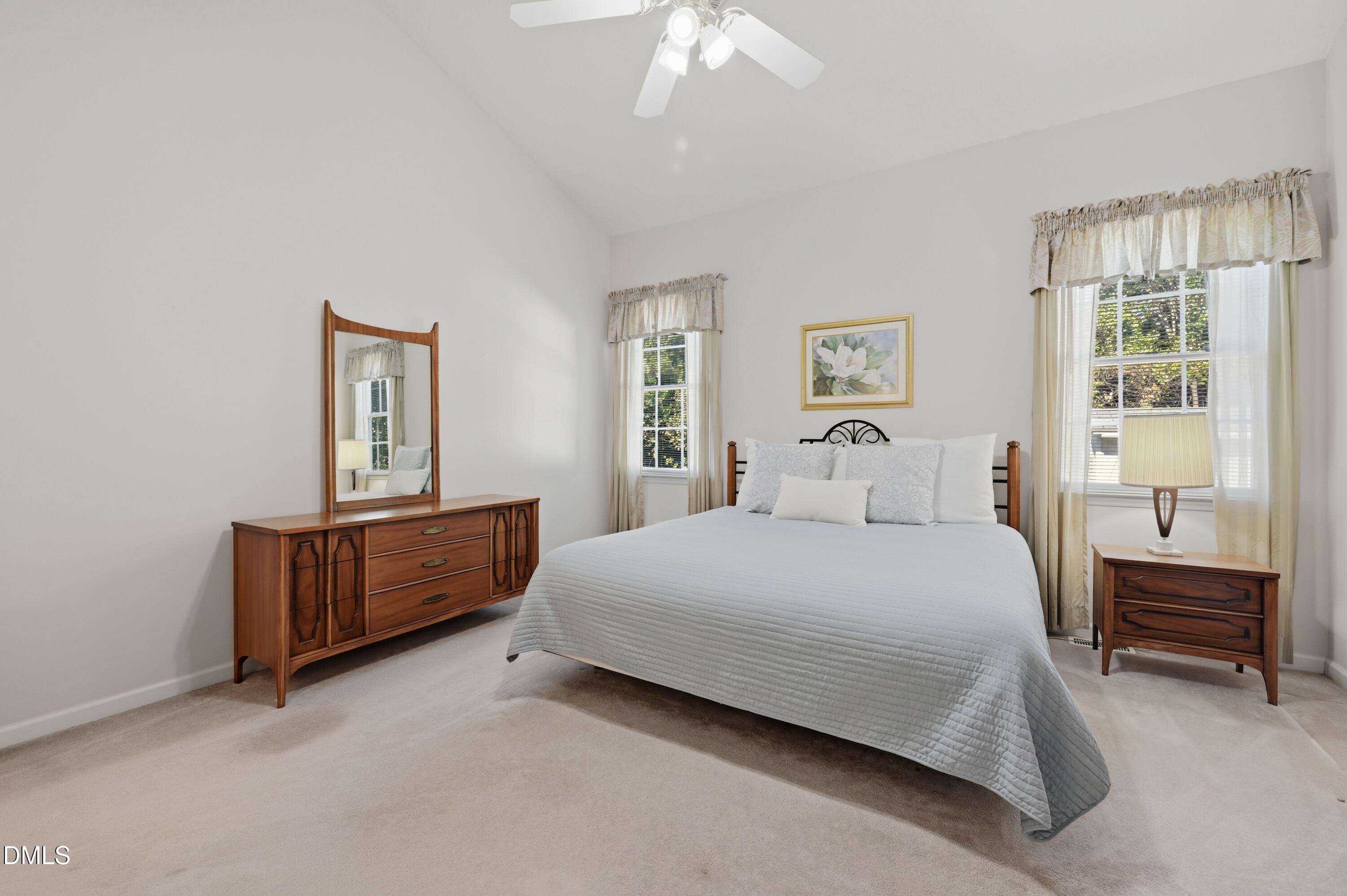 6801 Lynnoak Drive Raleigh, NC 27613 - Photo 14 of 30 a bedroom with a bed and window