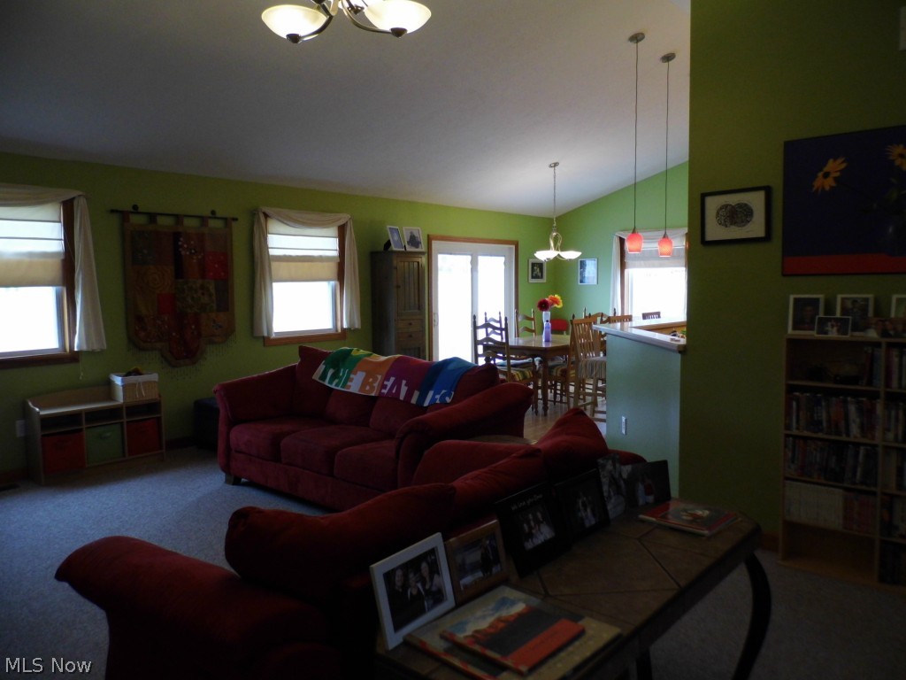 196 Ry Road Wadsworth, OH 44281 - Photo 25 of 25 196 RY RD WADSWORTH OH 44281 Ranch 4 Bedroom, 3 Full Bath, 2 Car Garage in Fawn Meadows:
The open floor plan is enhanced by the great double hung windows and venetian blinds with accent curtains. Sliding door opens to a rear patio great for grilling!