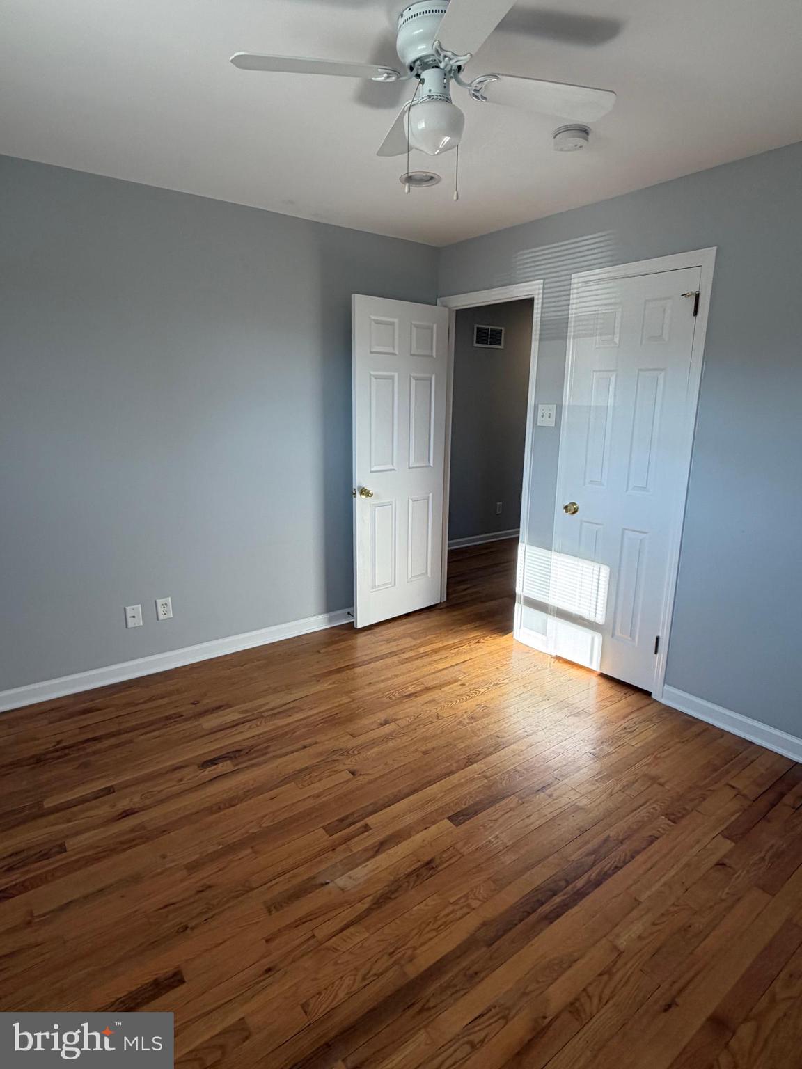 2630 Millcreek Road Wilmington, DE 19808 - Photo 17 of 26 a view of an empty room with wooden floor