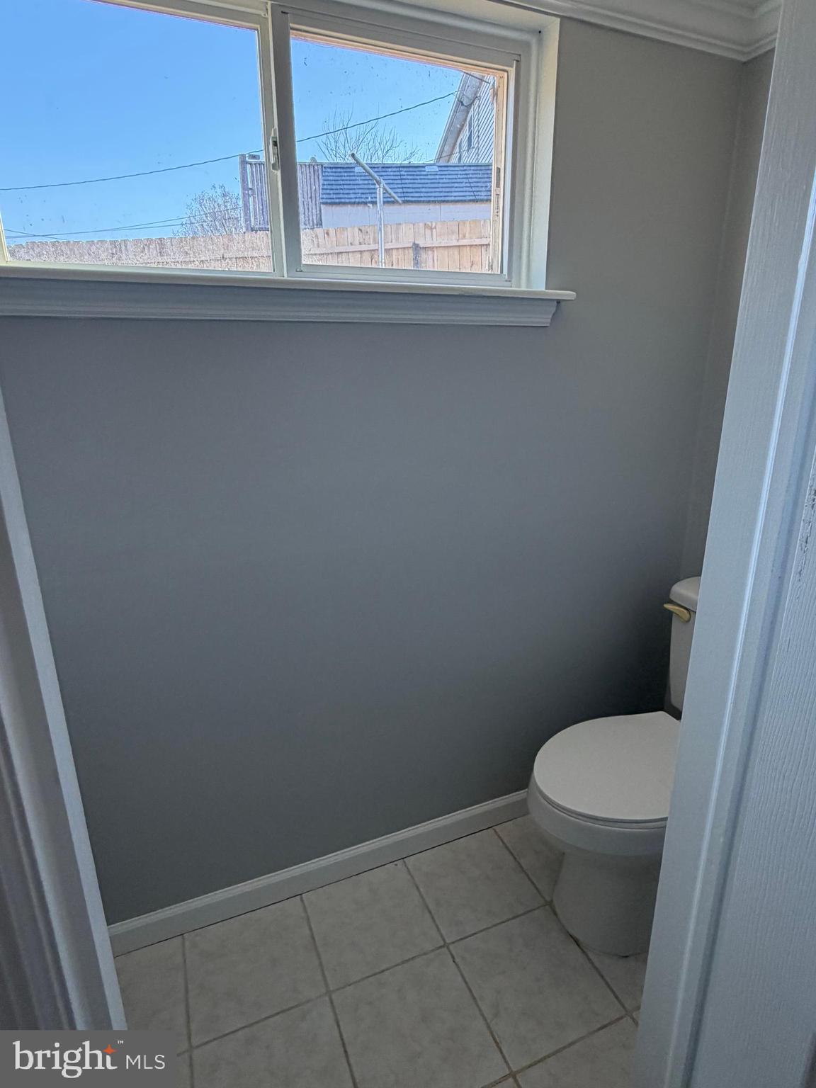 2630 Millcreek Road Wilmington, DE 19808 - Photo 20 of 26 a white toilet sitting next to a window