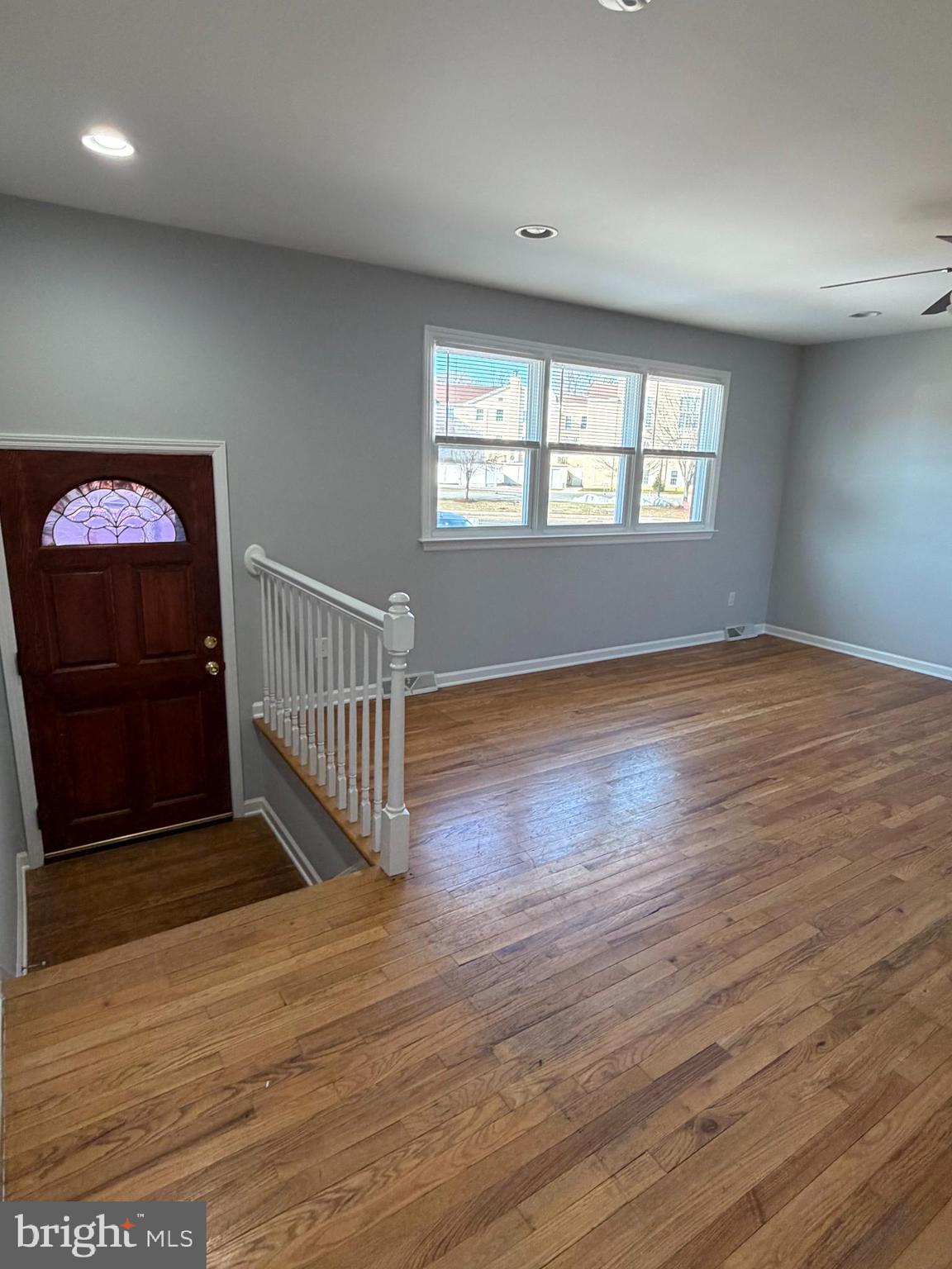 2630 Millcreek Road Wilmington, DE 19808 - Photo 4 of 26 wooden floor in an empty room with a window