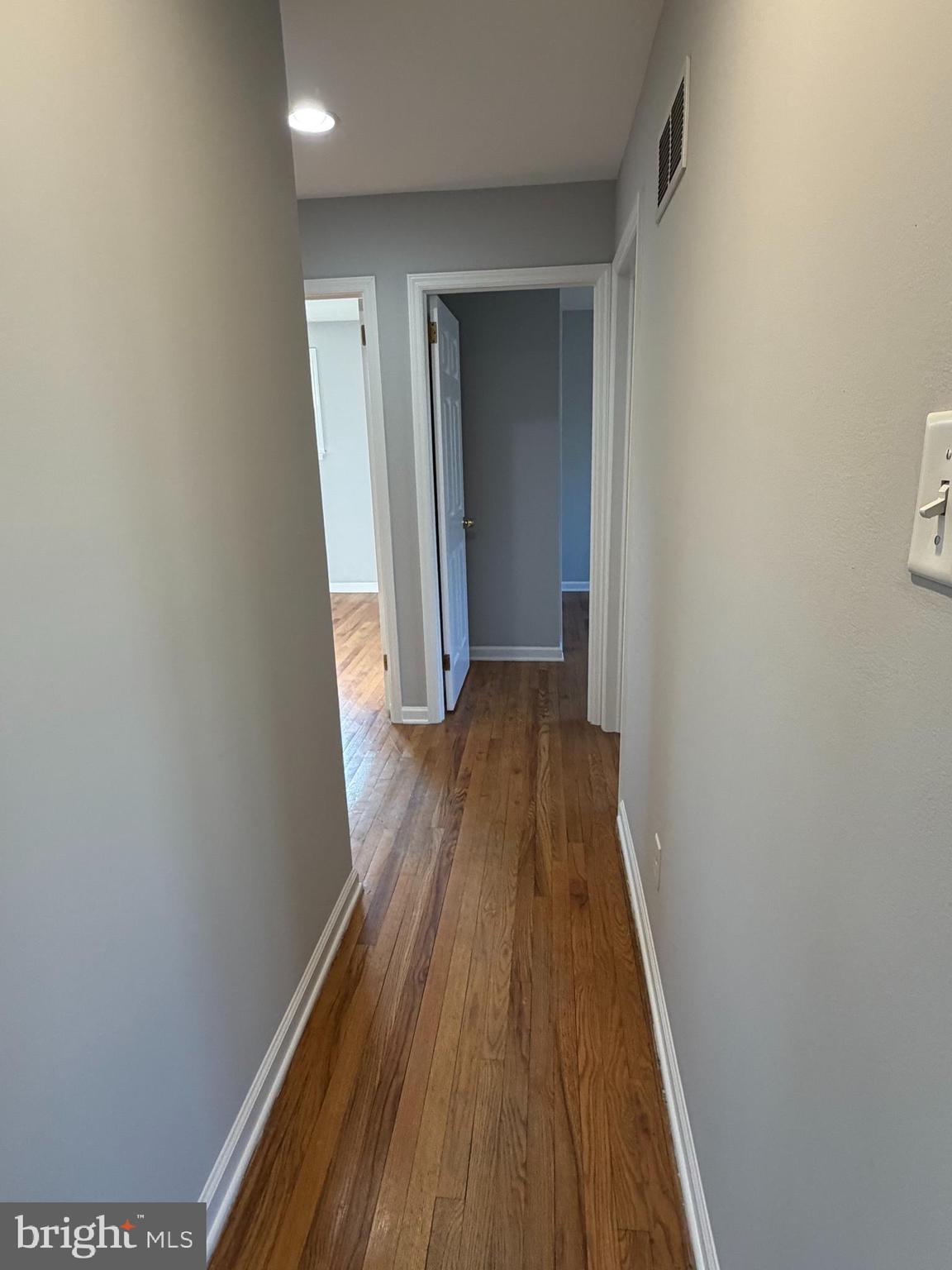 2630 Millcreek Road Wilmington, DE 19808 - Photo 9 of 26 a view of a hallway with wooden floor