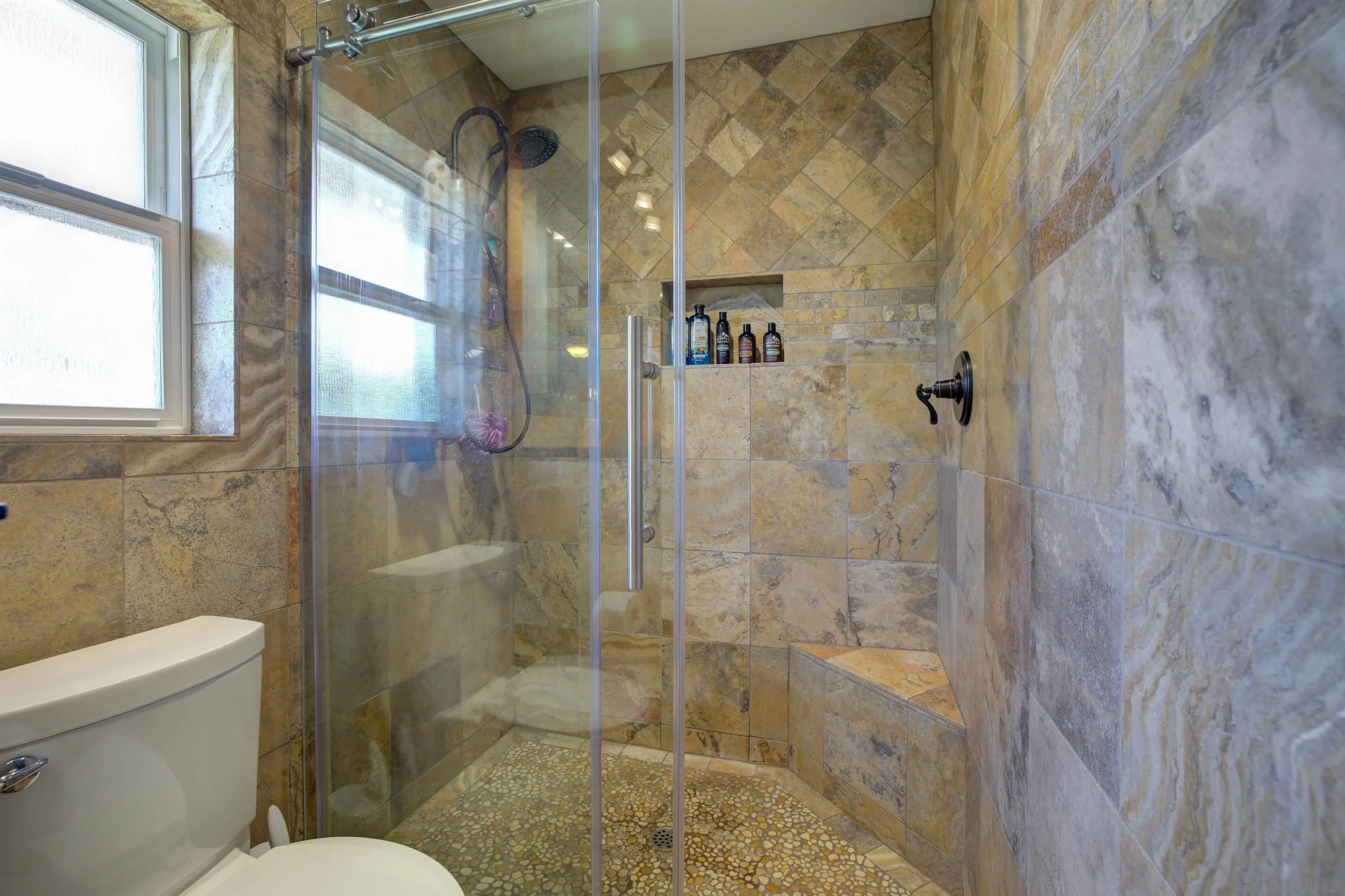 15835 Mactan Road Valley Center, CA 92082 - Photo 16 of 31 a bathroom with a shower and toilet