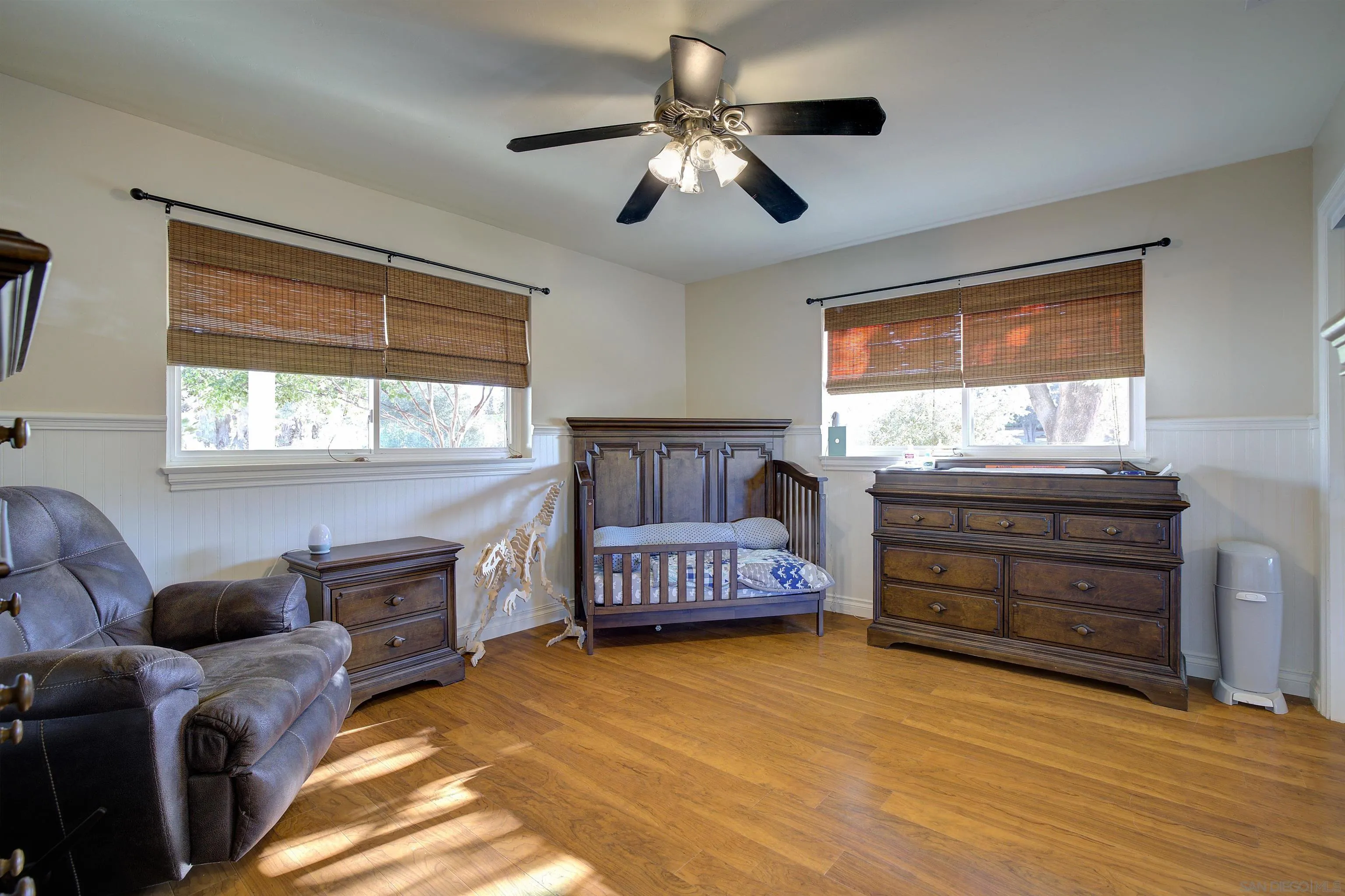 15835 Mactan Road Valley Center, CA 92082 - Photo 17 of 31 a bedroom with a bed and a window