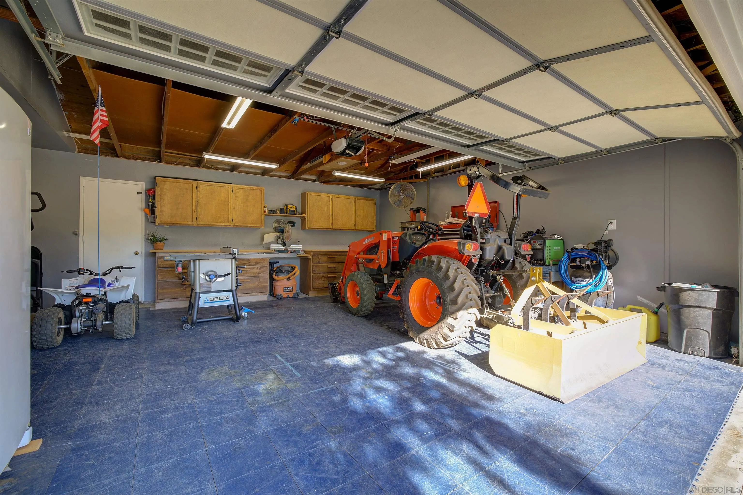 15835 Mactan Road Valley Center, CA 92082 - Photo 23 of 31 a view of a storage room with a table and chairs