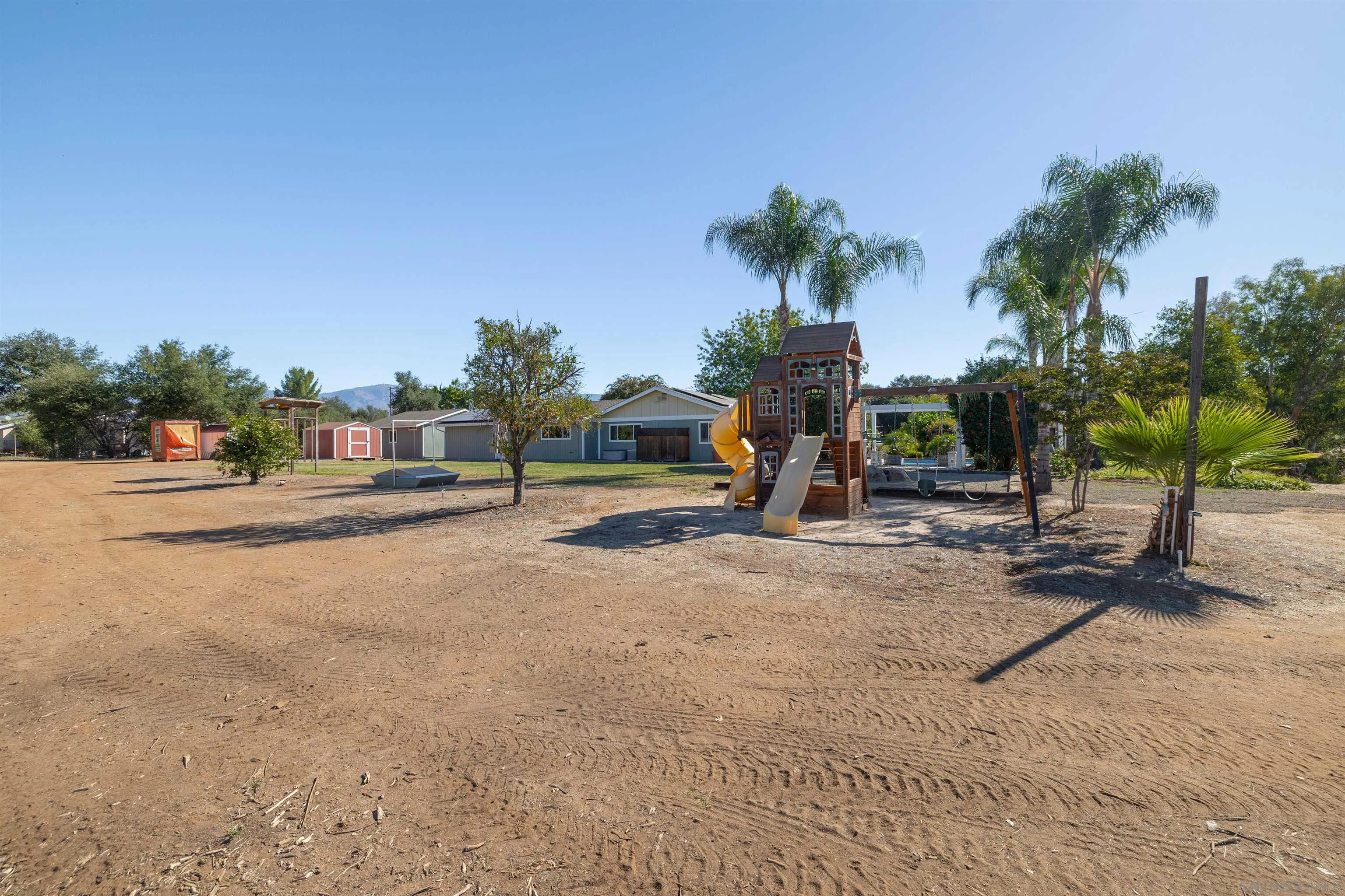 15835 Mactan Road Valley Center, CA 92082 - Photo 31 of 31 a view of a street with a bike park