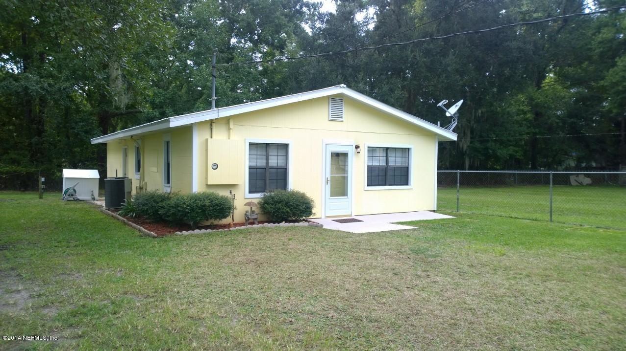 13506 Yellow Bluff Road Jacksonville, FL 32226 - Photo 18 of 24 a view of a house with backyard and garden
