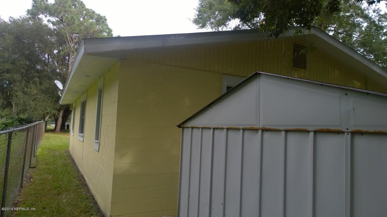 13506 Yellow Bluff Road Jacksonville, FL 32226 - Photo 19 of 24 a house with trees in the background