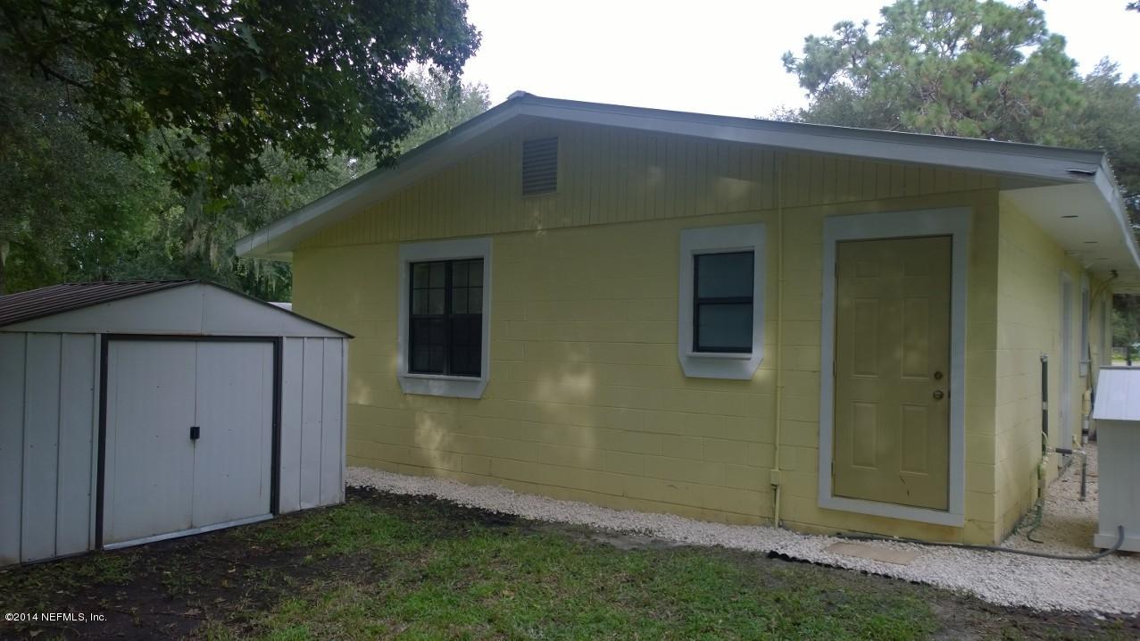 13506 Yellow Bluff Road Jacksonville, FL 32226 - Photo 21 of 24 a backyard of a house with lots of green space