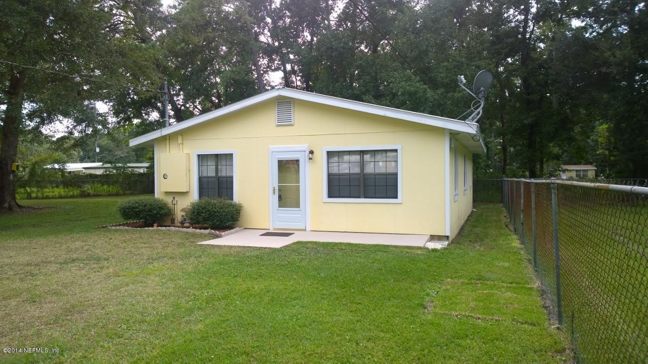13506 Yellow Bluff Road Jacksonville, FL 32226 - Photo 23 of 24 a view of a house with a yard