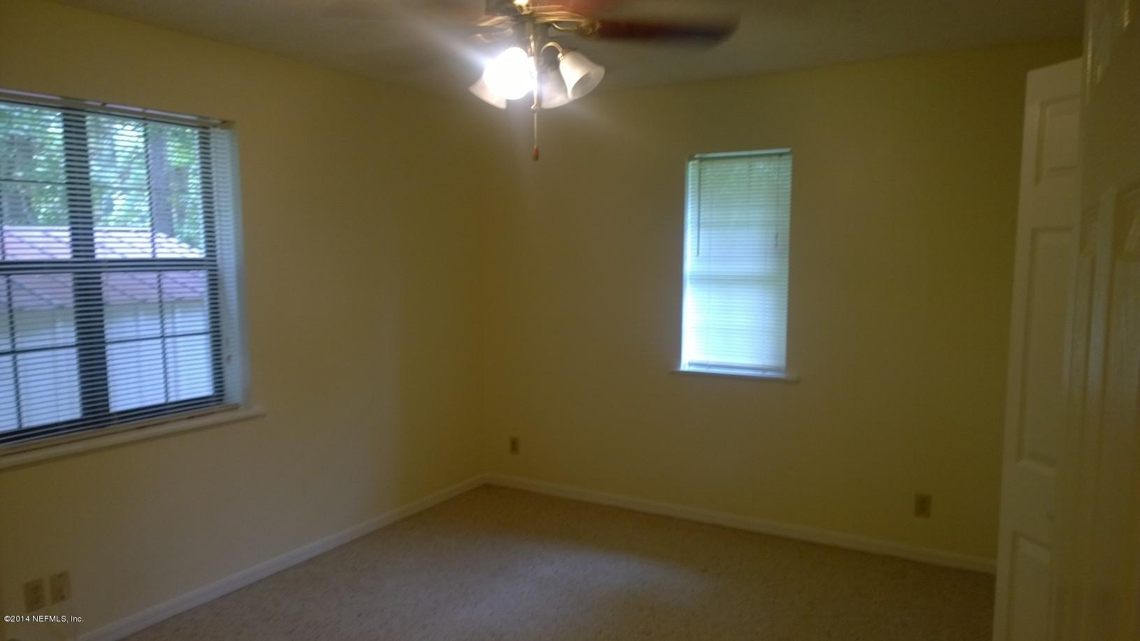 13506 Yellow Bluff Road Jacksonville, FL 32226 - Photo 9 of 24 a view of a small space with a window