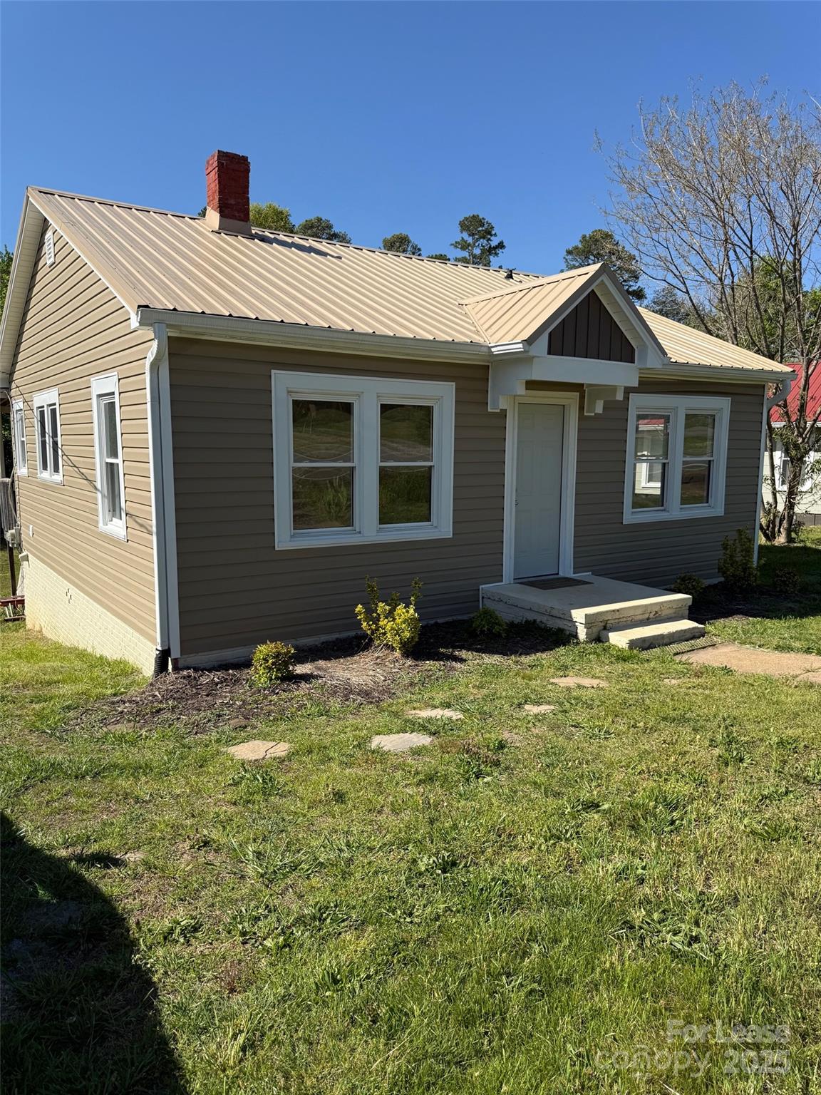 2140 Enon Road Morganton, NC 28655 - Photo 2 of 13 a front view of a house with a yard