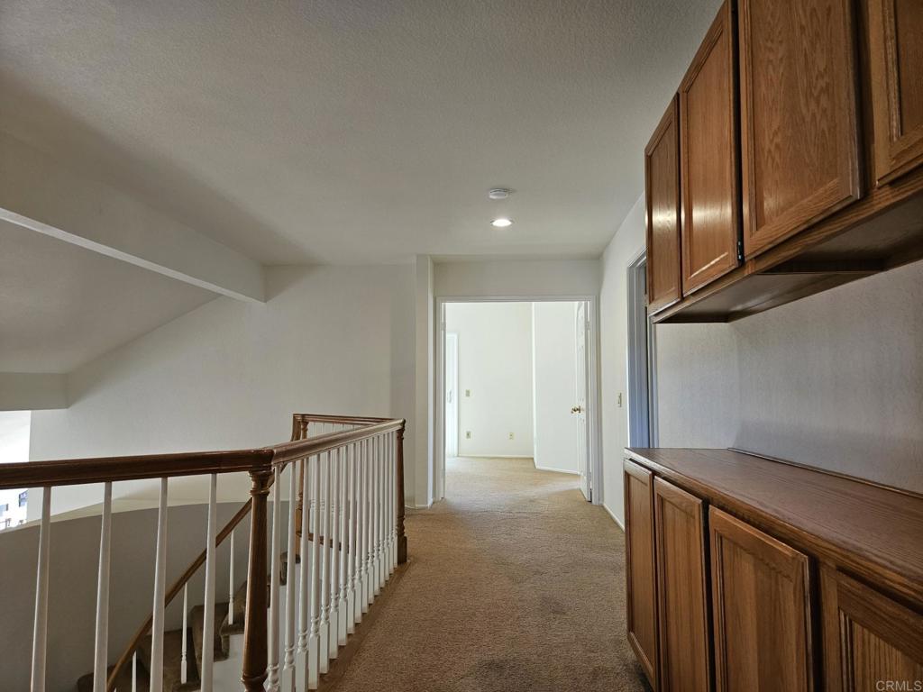 9329 Parus Point San Diego, CA 92129 - Photo 14 of 30 a view of hallway