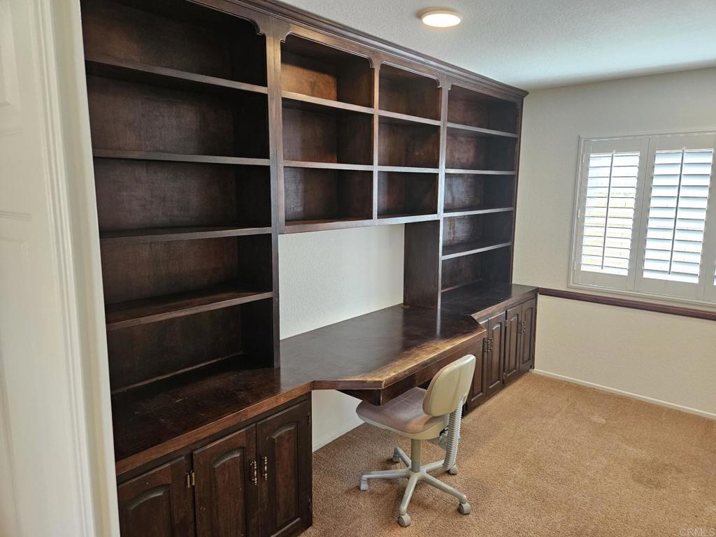 9329 Parus Point San Diego, CA 92129 - Photo 15 of 30 a room with furniture and a window