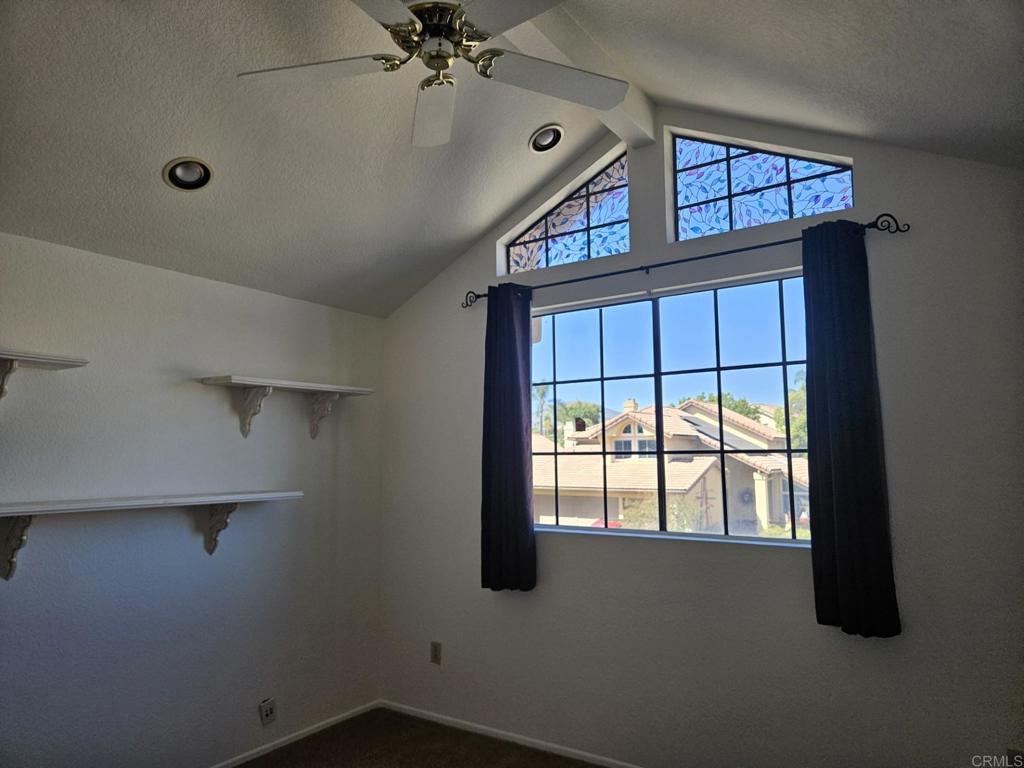 9329 Parus Point San Diego, CA 92129 - Photo 18 of 30 an empty room with windows