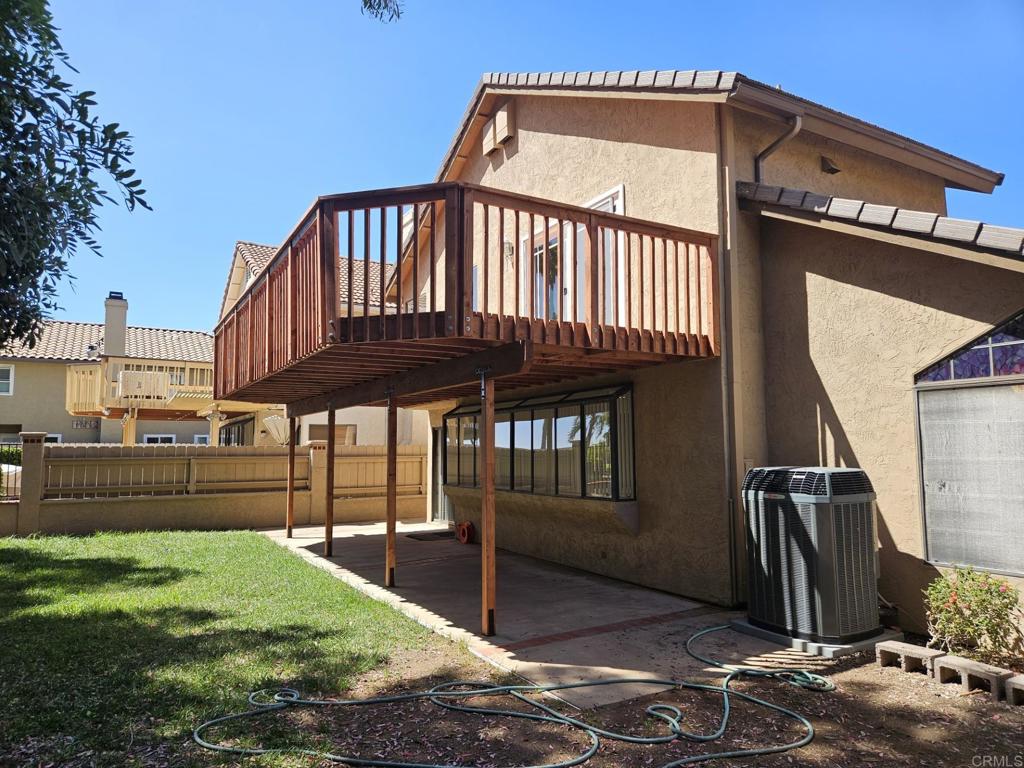 9329 Parus Point San Diego, CA 92129 - Photo 23 of 30 a view of a house with a balcony