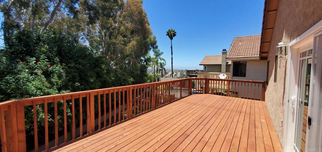 9329 Parus Point San Diego, CA 92129 - Photo 29 of 30 a balcony with wooden floor and city view