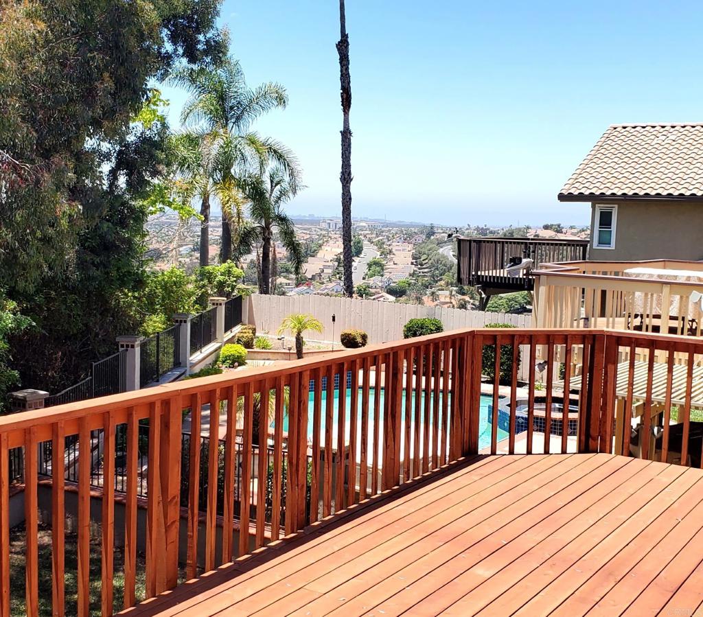 9329 Parus Point San Diego, CA 92129 - Photo 30 of 30 a balcony with wooden floor