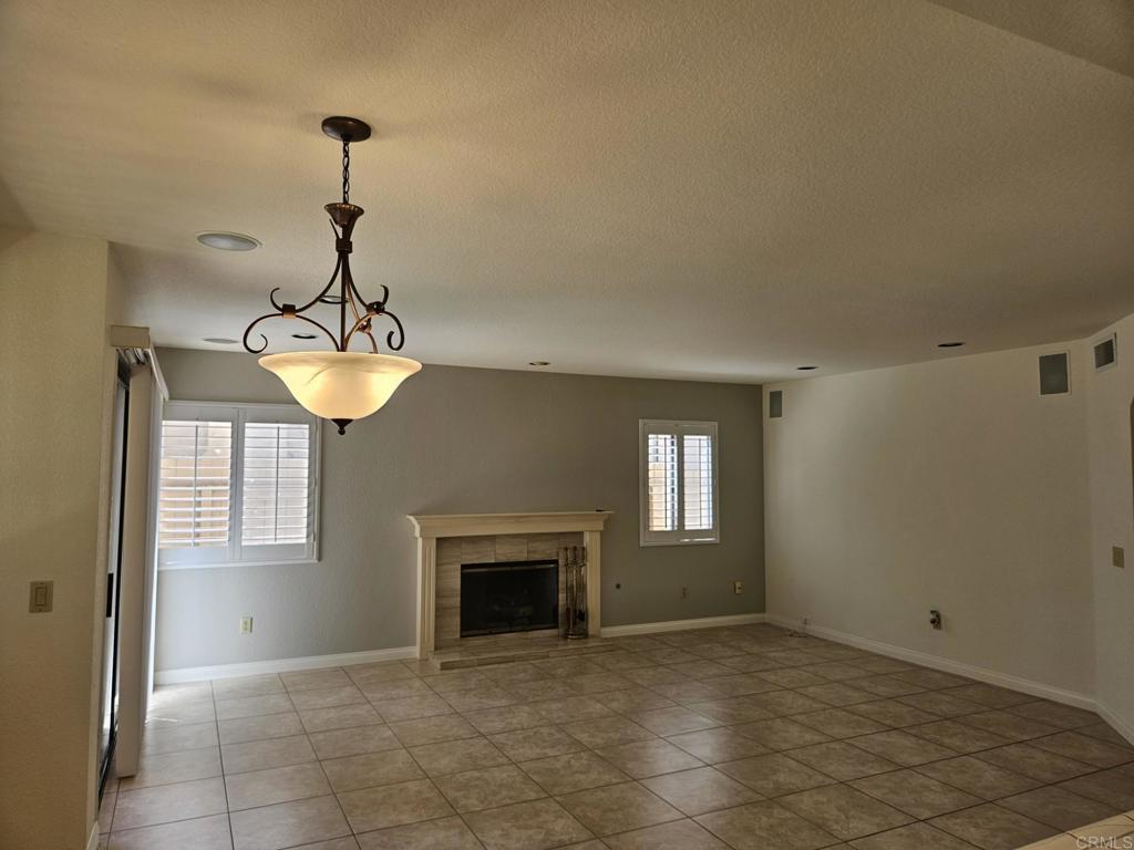 9329 Parus Point San Diego, CA 92129 - Photo 8 of 30 a view of empty room with windows