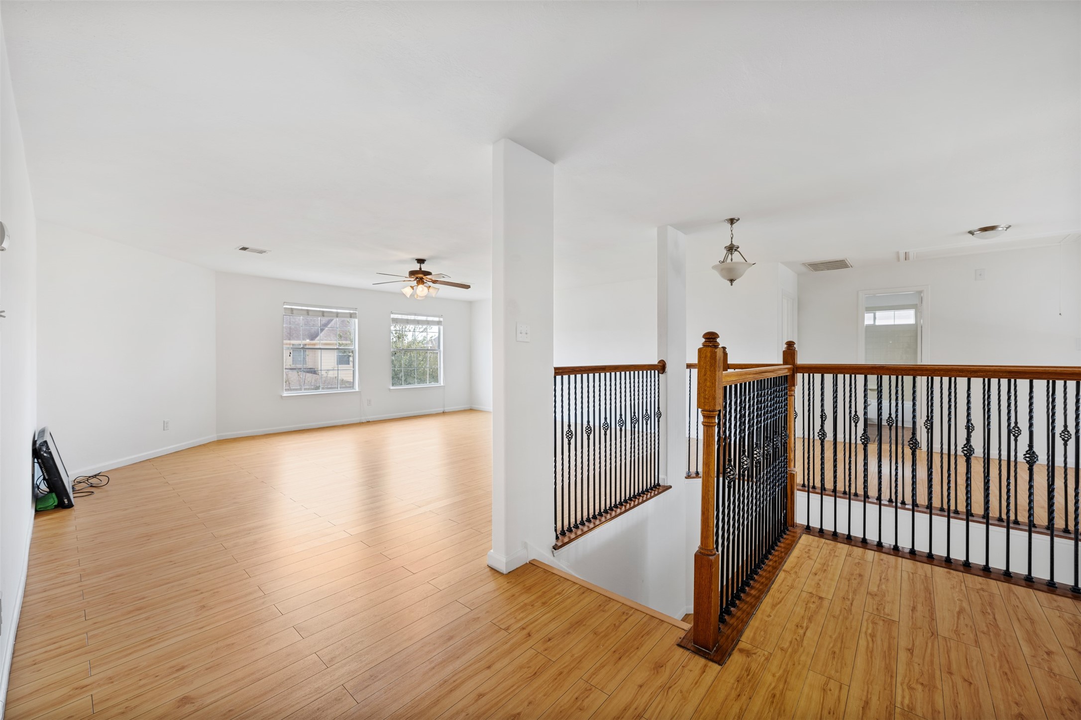 6806 Stableton Lane Houston, TX 77049 - Photo 26 of 50 a view of a room with wooden floor