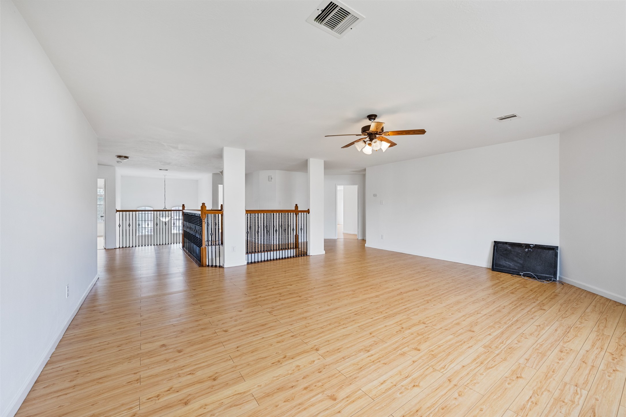 6806 Stableton Lane Houston, TX 77049 - Photo 30 of 50 a view of empty room with wooden floor