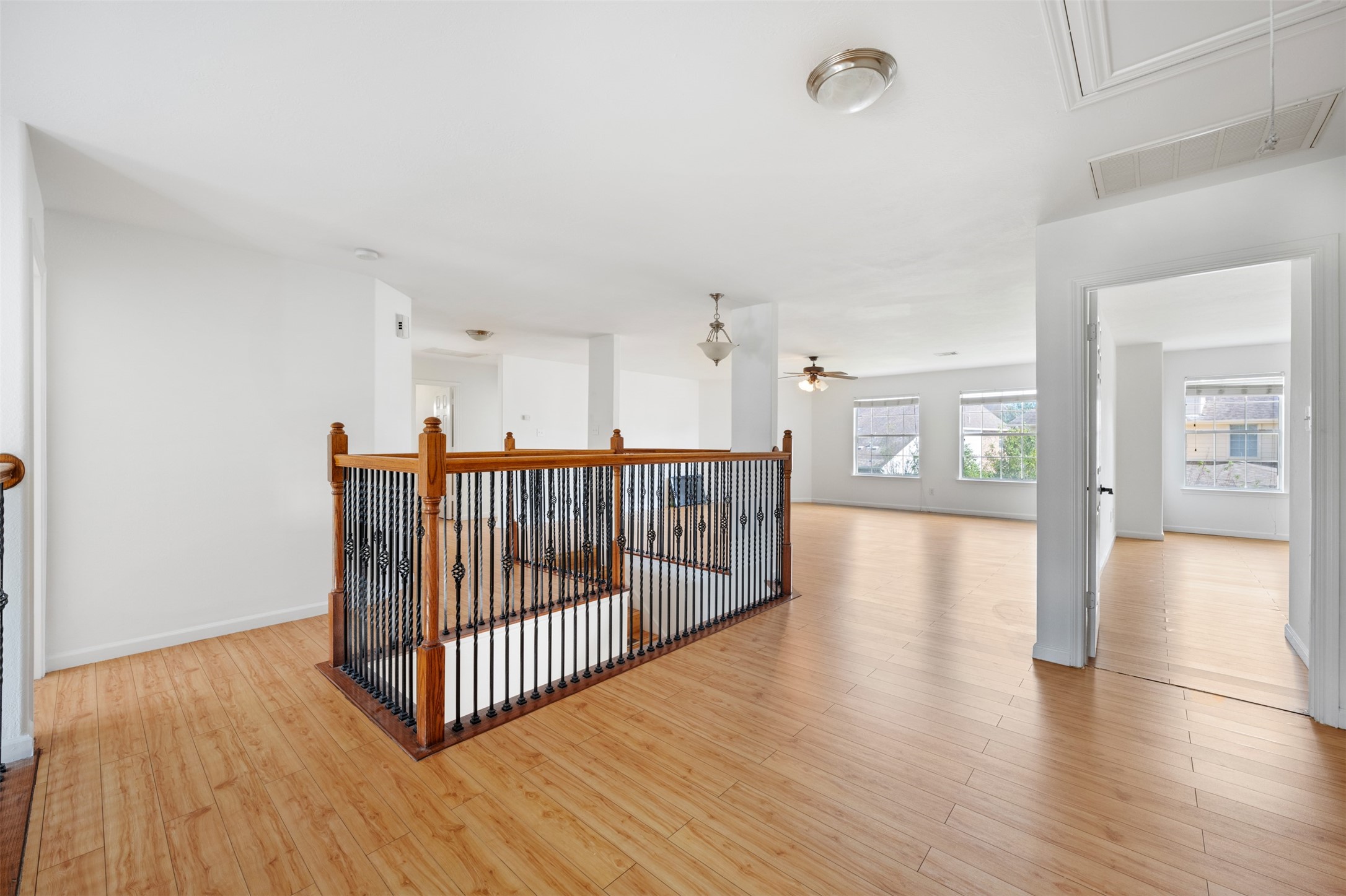 6806 Stableton Lane Houston, TX 77049 - Photo 31 of 50 a view of a room with wooden floor