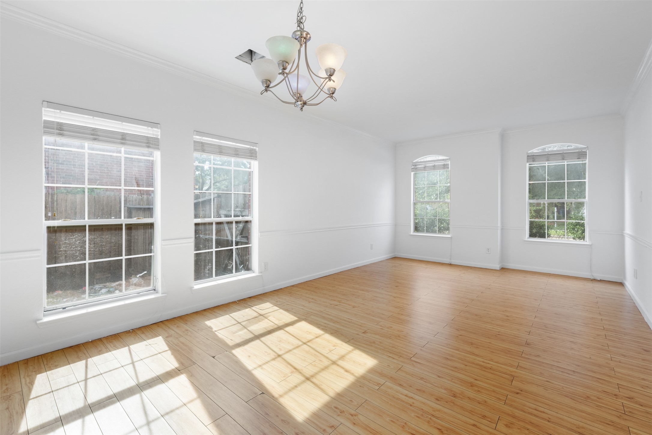 6806 Stableton Lane Houston, TX 77049 - Photo 42 of 50 a view of empty room with wooden floor and fan