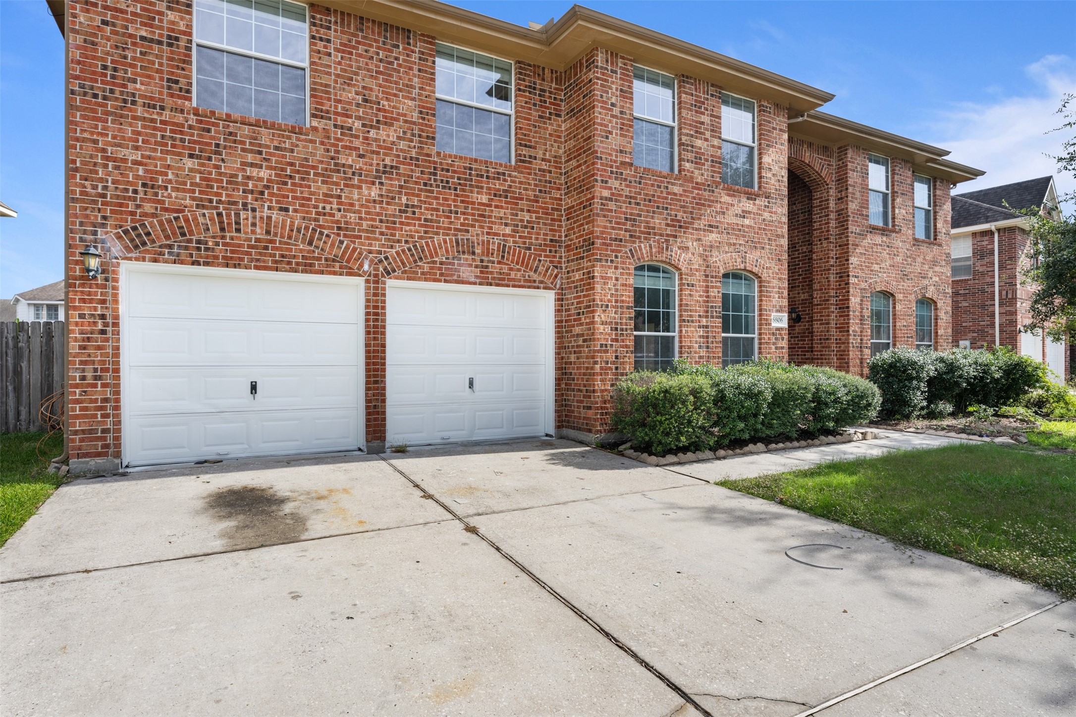 6806 Stableton Lane Houston, TX 77049 - Photo 5 of 50 a front view of a building with a yard