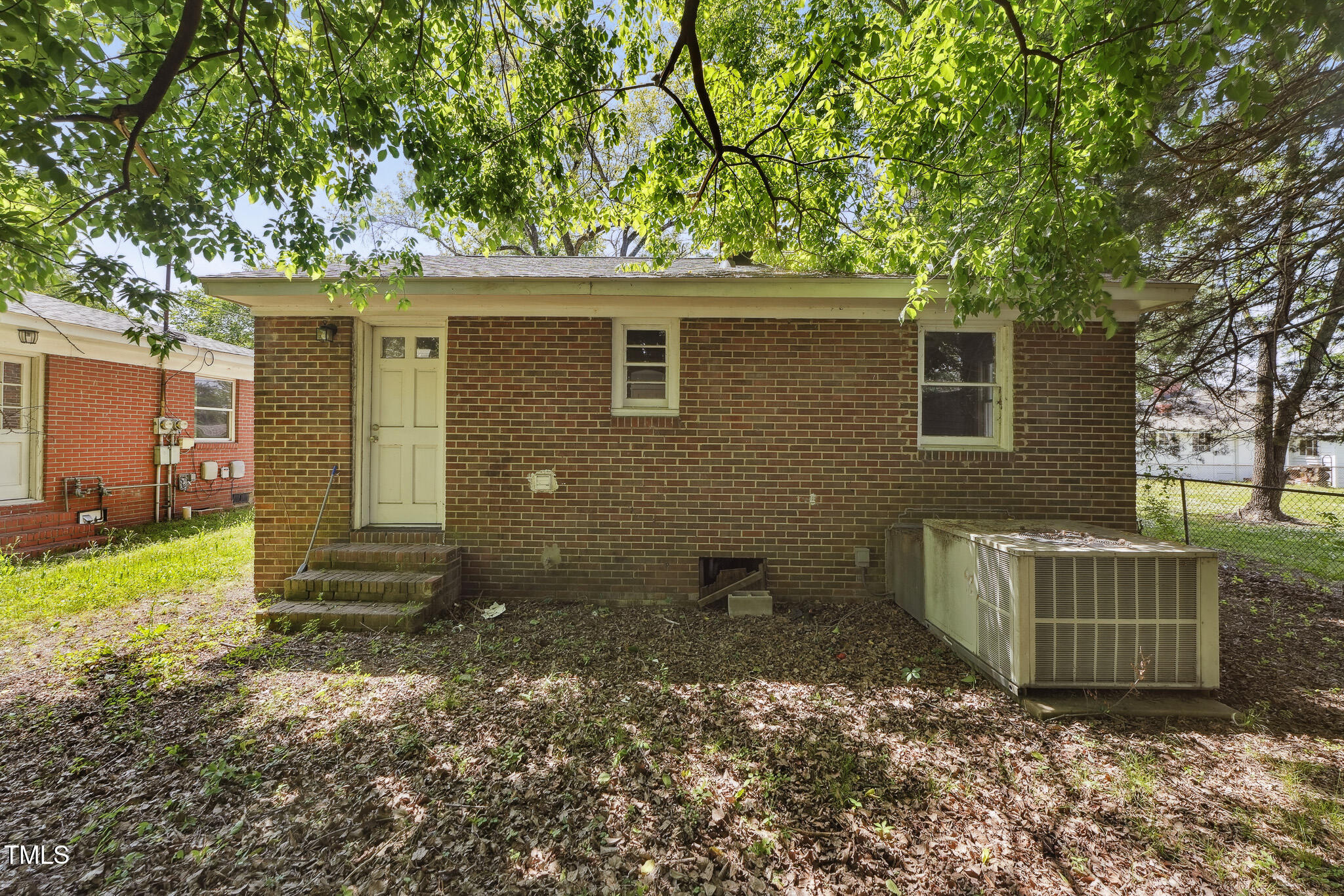 6316 Ward Boulevard Wilson, NC 27893 - Photo 15 of 36 a house view with a backyard space