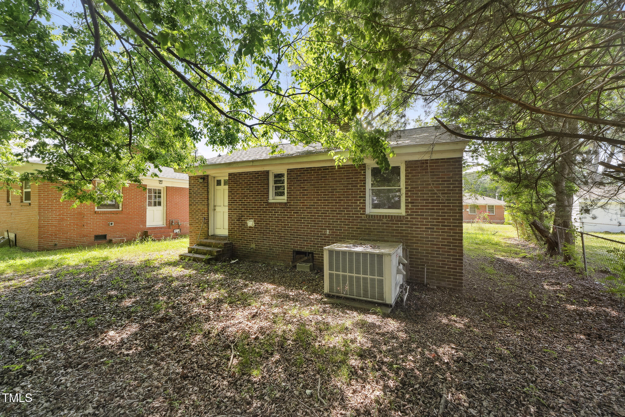 6316 Ward Boulevard Wilson, NC 27893 - Photo 16 of 36 a house view with a backyard space