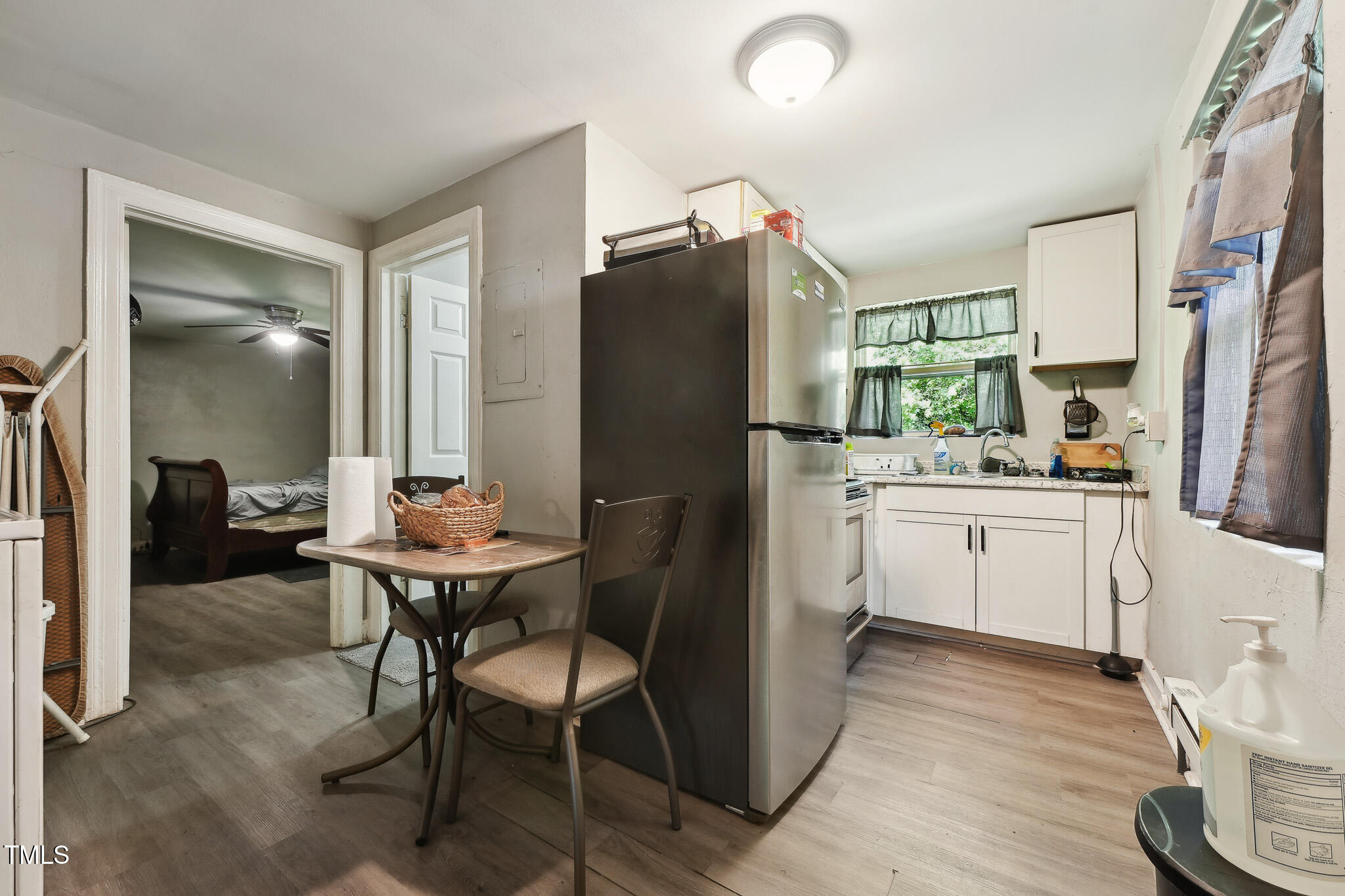 6316 Ward Boulevard Wilson, NC 27893 - Photo 31 of 36 a kitchen with a sink appliances and cabinets
