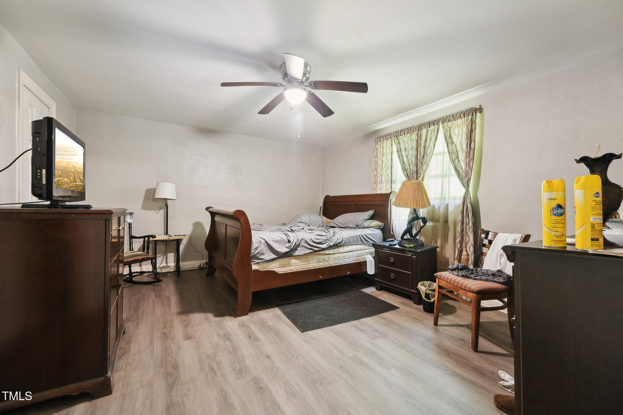 6316 Ward Boulevard Wilson, NC 27893 - Photo 34 of 36 a living room with furniture and a fireplace