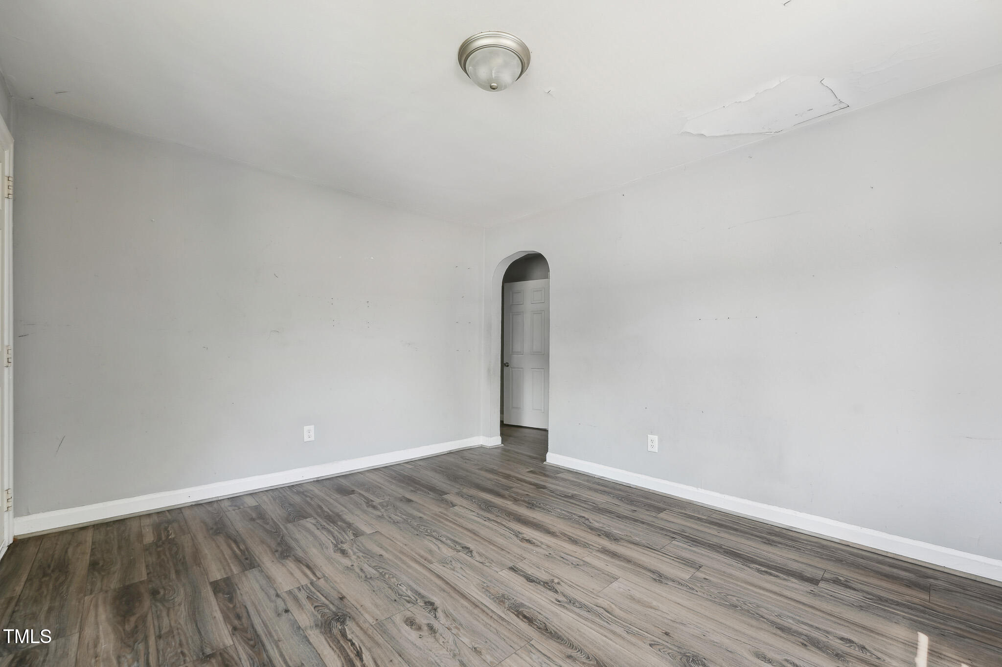 6316 Ward Boulevard Wilson, NC 27893 - Photo 5 of 36 a view of an empty room with wooden floor
