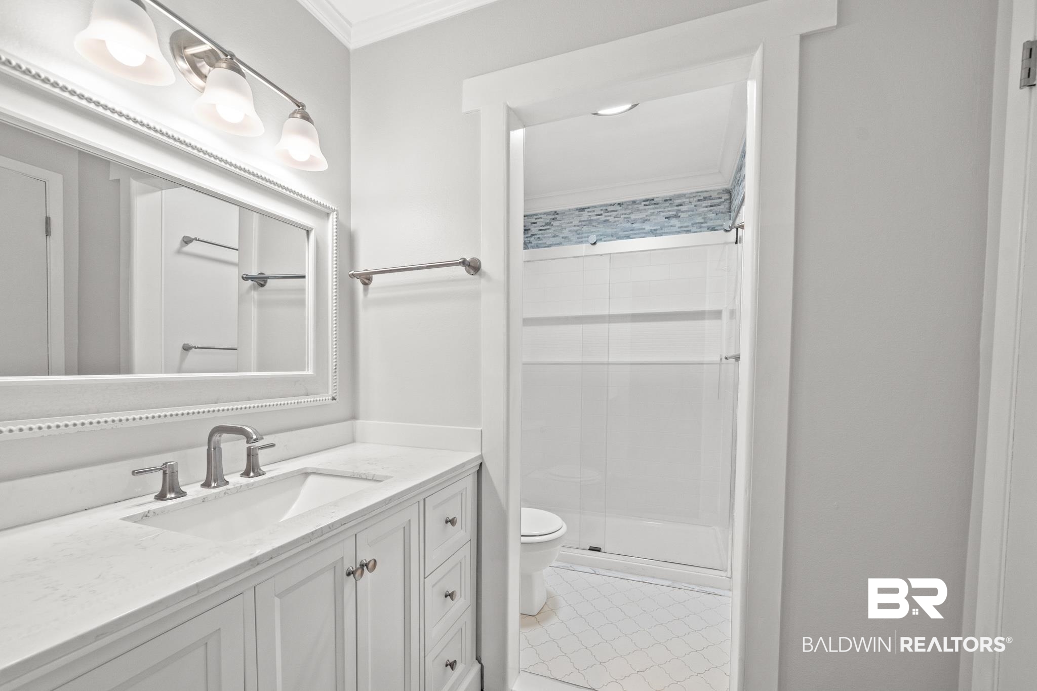 2901 Grant Street, Unit 802 Mobile, AL 36606 - Photo 20 of 37 Bathroom featuring vanity, tile patterned floors, a shower with shower door, crown molding, and toilet