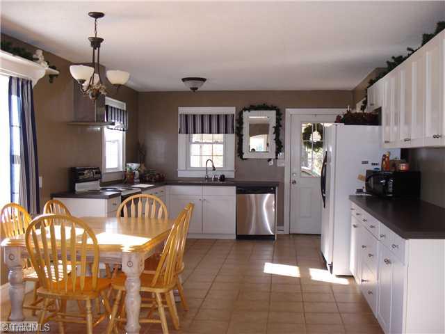 899 Robert Beck Road Lexington, NC 27292 - Photo 3 of 16 Kitchen. Large updated, eat-in kitchen with lots of cabinets and tiled floors