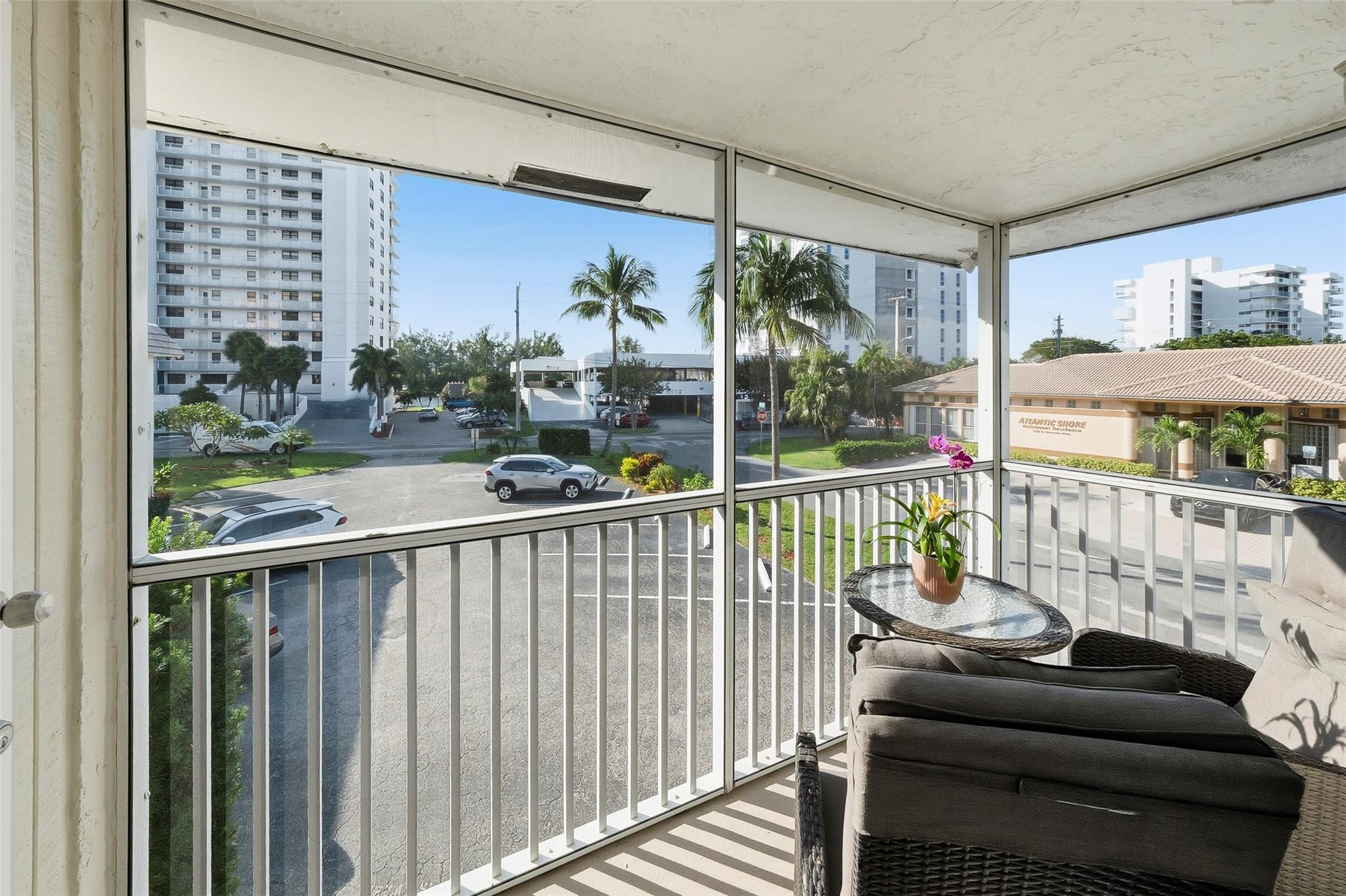 1450 North Riverside Drive, Unit 201 Pompano Beach, FL 33062 - Photo 23 of 30 a view of a balcony with furniture