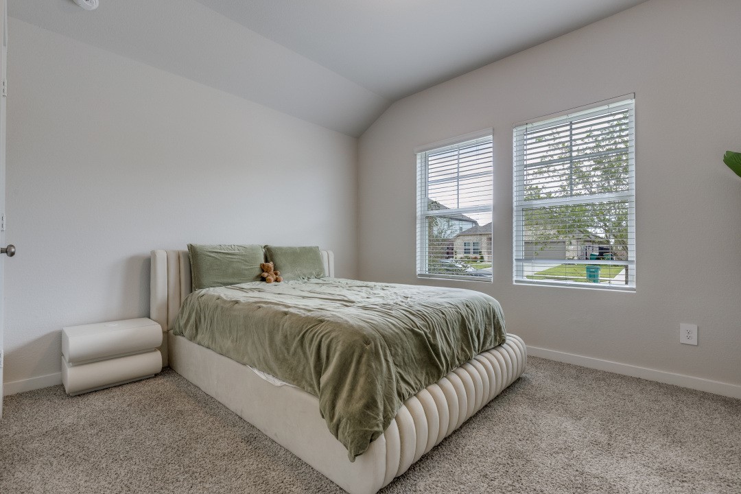 1318 Cascade Hls Drive Rosharon, TX 77583 - Photo 18 of 25 a bedroom with a bed and window