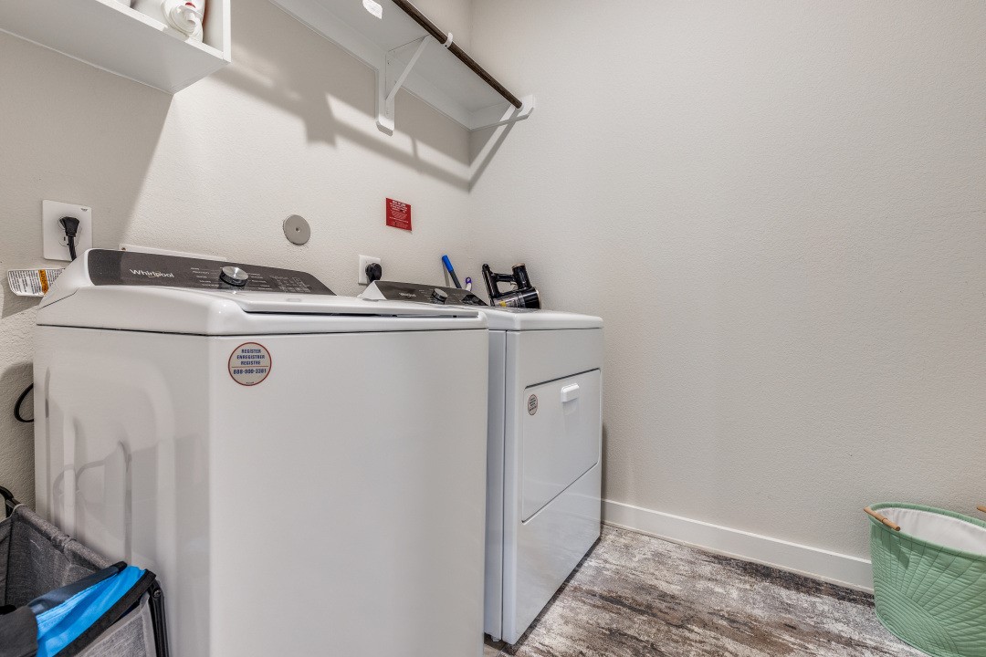 1318 Cascade Hls Drive Rosharon, TX 77583 - Photo 21 of 25 a utility room with dryer and washer