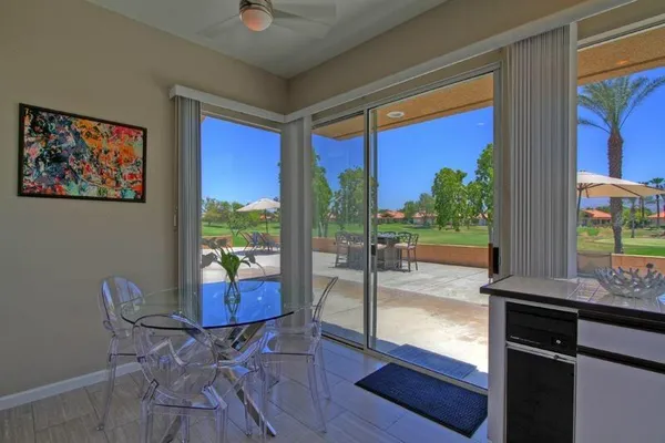 a view of a living room and a porch