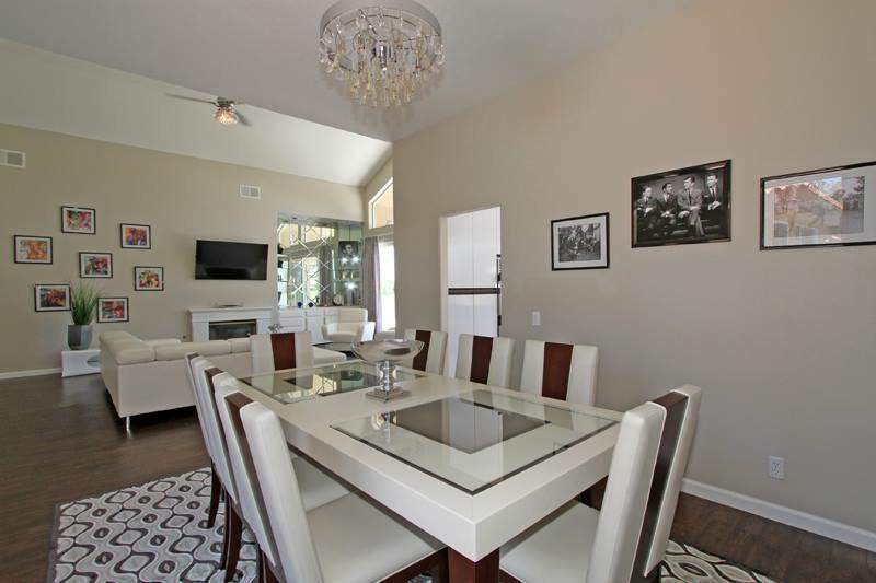65 La Costa Drive Rancho Mirage, CA 92270 - Photo 10 of 22 a living room with furniture and a flat screen tv
