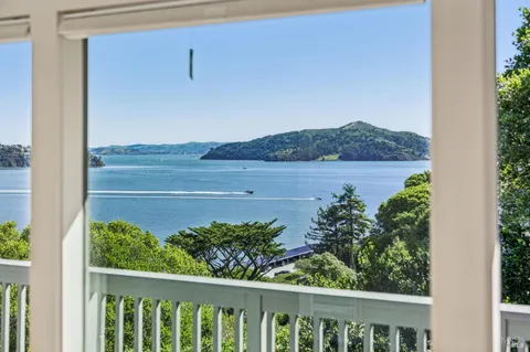 a view of an empty room with a balcony