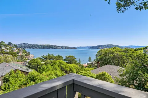 a view of a lake from a balcony