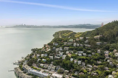 a aerial view of a house with lake view