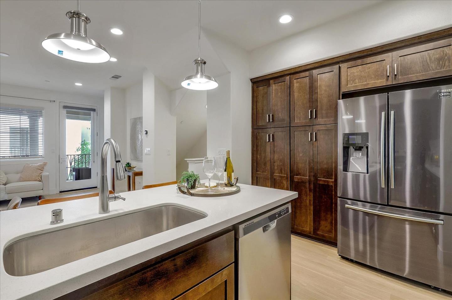 37524 Cape Cod Road, Unit 8 Newark, CA 94560 - Photo 5 of 24 a kitchen with stainless steel appliances a sink and refrigerator