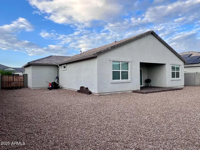 a house view with a backyard space