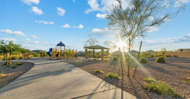 a view of a street with a building in the background